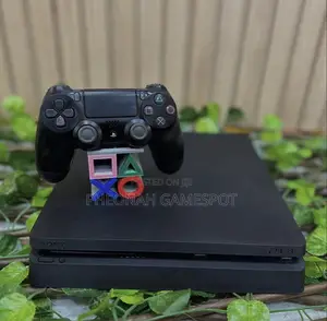 Playstation 4 Slim, 2 Pads, 13 Amazing Games Inside.