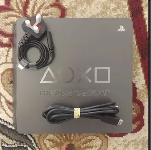 Ps4 Slim, Neat Console, 2 Pads, 16 Top Games Installed.