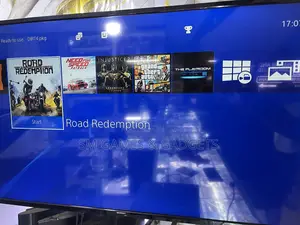 Playstation 4 Slim (With a Bundle of 10 Games and 2 Pads)