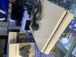 Playstation 4 Slim (With a Bundle of 10 Games and 2 Pads)