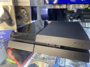 Playstation 4 Standard (Chipped With 10 Games and 2 Controllers )