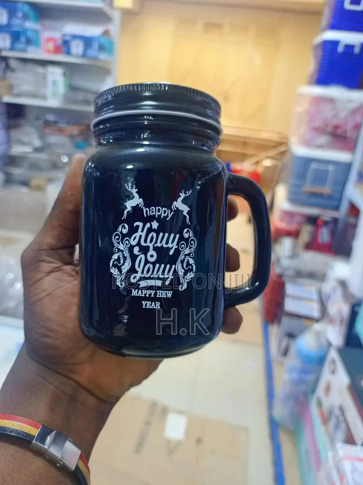 Black Glass Mason Jar Mug With a Handle and a Lid.