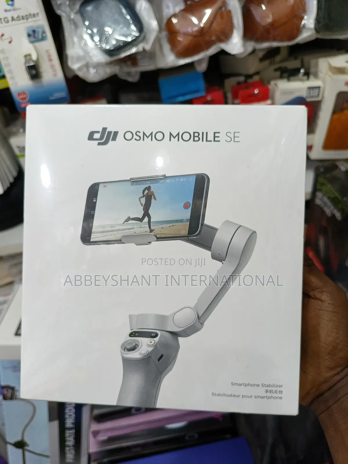 Dji Osmo Mobile Se, a 3-Axis Smartphone Gimbal Stabilizer.