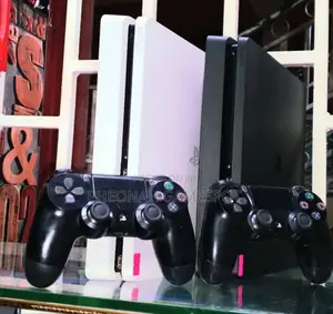 This Playstation 4 Slim Comes With One Year Warranty, 2 Pads 13games