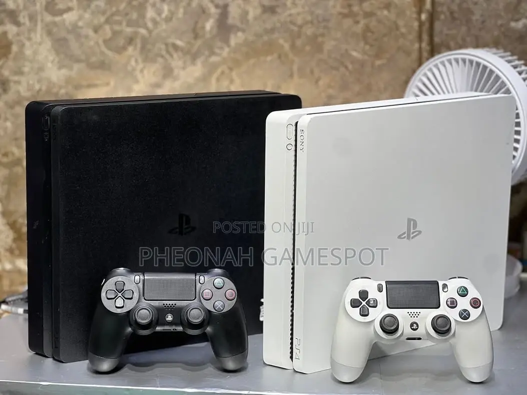 Ps4 Slim, Super Clean, 2 Pads, 15 Loaded Games Inside.