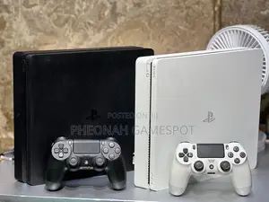 Ps4 Slim, Super Clean, 2 Pads, 15 Loaded Games Inside.
