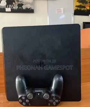 14. Playstation 4 Slim, 2 Pads, 10 Cool Titles Inside.