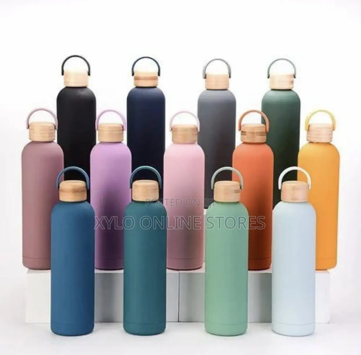 A Collection of Insulated Water Bottles With Bamboo Lids