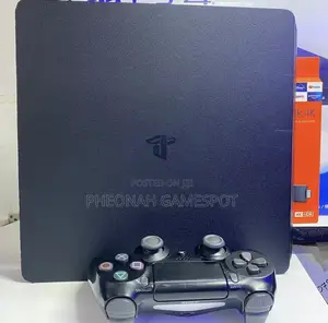 Ps4 Slim, Clean and Sharp, 2 Pads, 15 Top Games Inside.