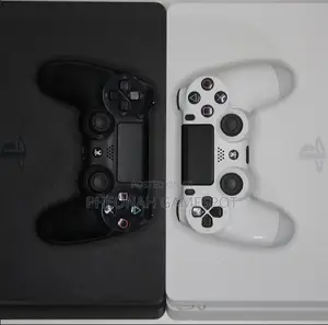 Playstation 4 Slim , 2 Pads, 17 Great Games Installed.