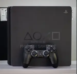 Ps4 Slim , Like New, 2 Pads, 13 Fun Games Preloaded.