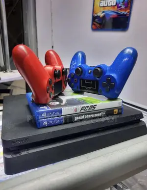 Playstation 4 Slim , 2 Pads, 15 Fun Games Preinstalled.