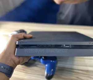 Playstation 4 Slim, 2 Pads, 17 Fun Games, Plug and Play.