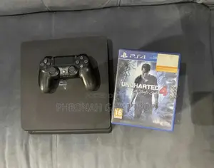 Playstation 4 Slim, 2 Pads, 11 Cool Games Installed.