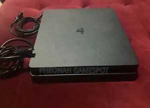 Ps4 Slim, Like New, 2 Pads, 15 Awesome Games Installed.