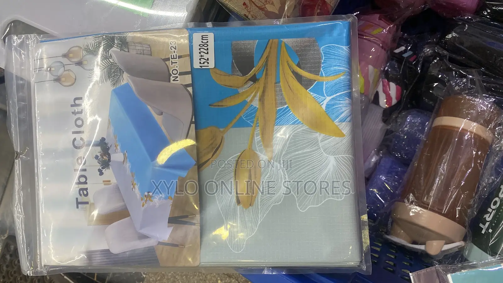 A 4 Seater Table Cloth With Blue and Gold Floral Design