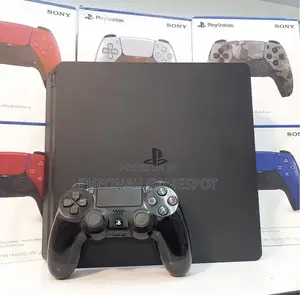 Ps4 Slim, Perfect Condition, 2 Pads, 11 Fun Games Inside.