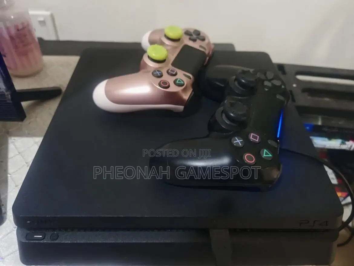 Playstation 4 Slim, 2 Pads, 14 Cool Titles Loaded Inside.