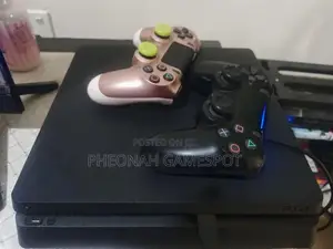 Playstation 4 Slim, 2 Pads, 14 Cool Titles Loaded Inside.