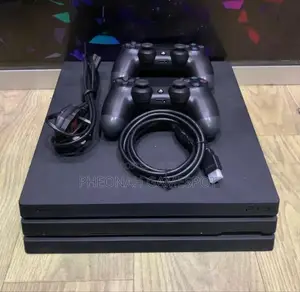 Playstation 4 Pro, Mint Condition, 25 Games, 2 Pads, 1 Year Warranty.