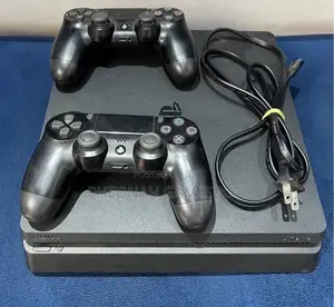 Ps4 System, 2 Controllers, 14 Exciting Games Loaded Inside.
