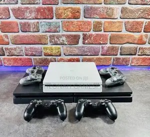 Playstation 4, 2 Controllers, 14 Quality Games Loaded Instantly.