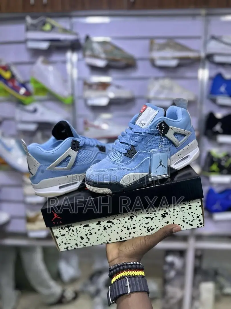 Nike Air Jordan 4 Retro “University Blue” Sneakers