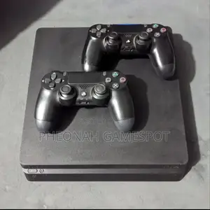 Chipped Playstation 4 Slim (Ps4 Slim) Used but New. 10 Games, 2 Pads