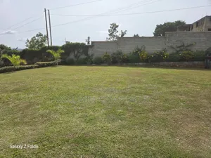 1 Acres of Fenced Land in Lubowa Entebbe Road