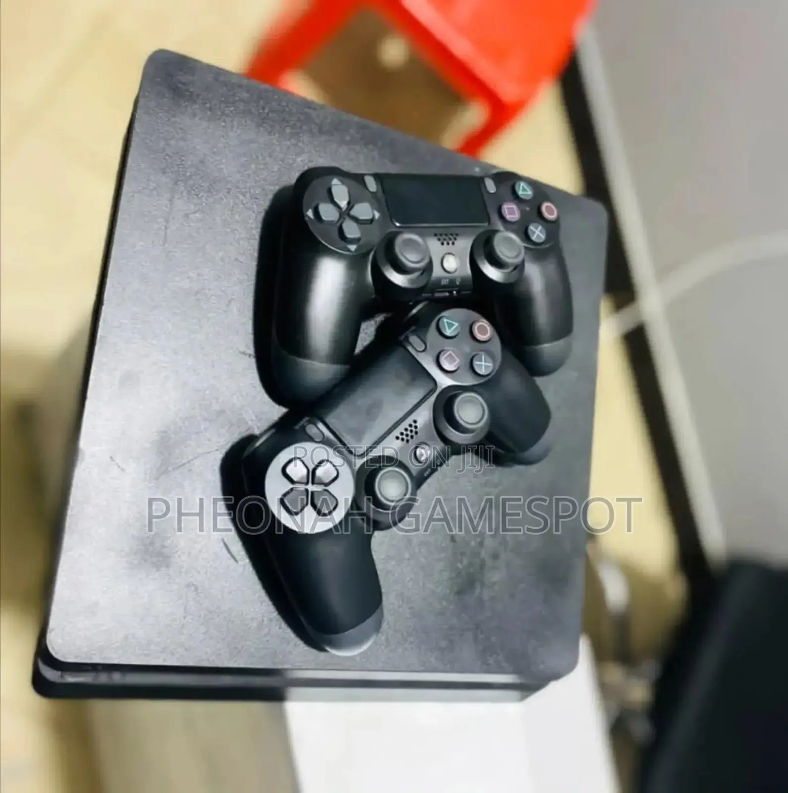 Playstation 4 Slim, 2 Controllers, 12 Games, Clean, 6 Months Warranty.