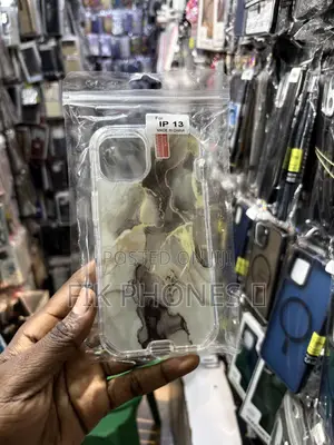 A Clear Protective Phone Case With a Blue, Pink, and Gold Marble Desi
