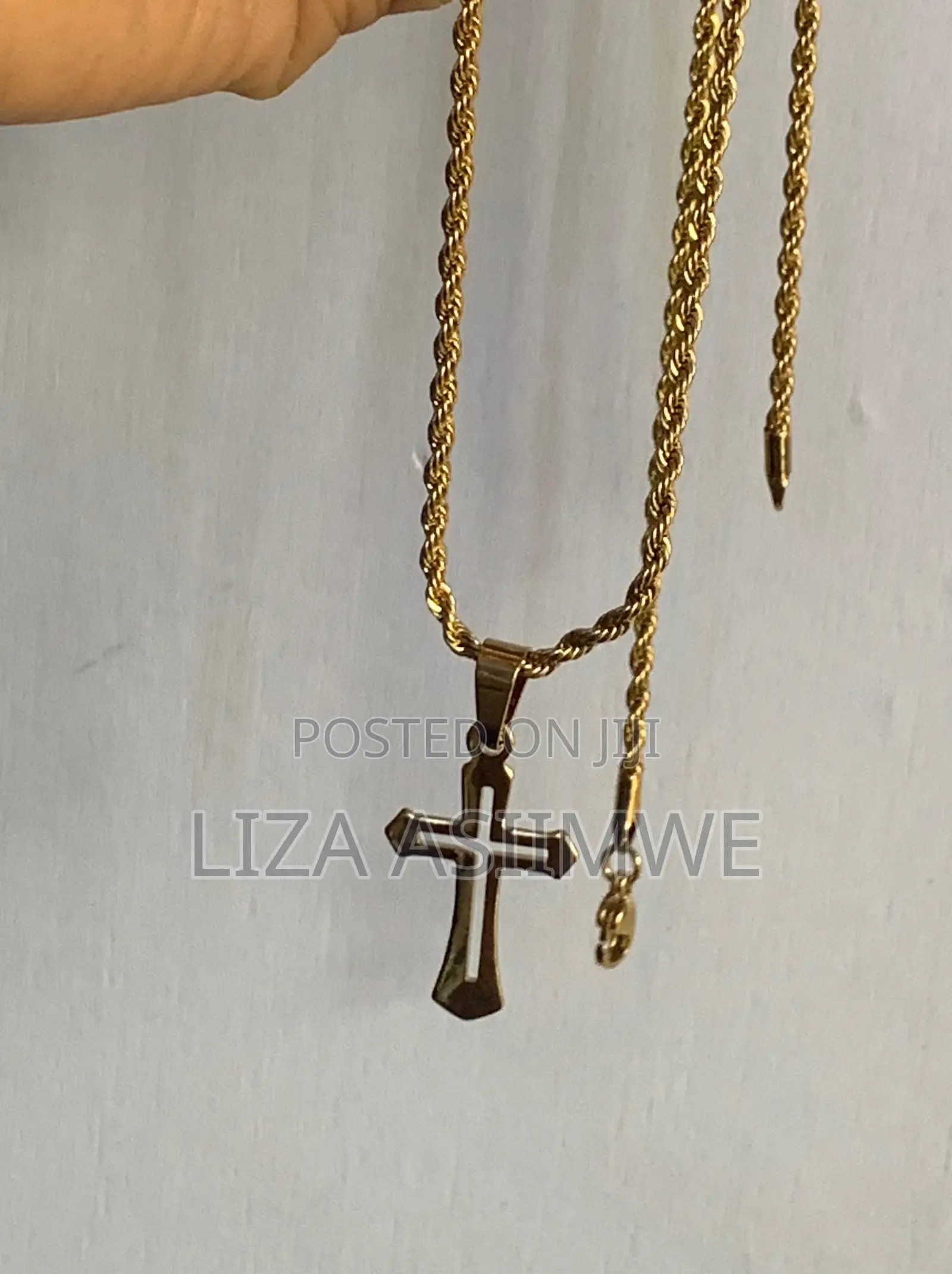Gold-Tone Cross Necklace With a Rope Chain