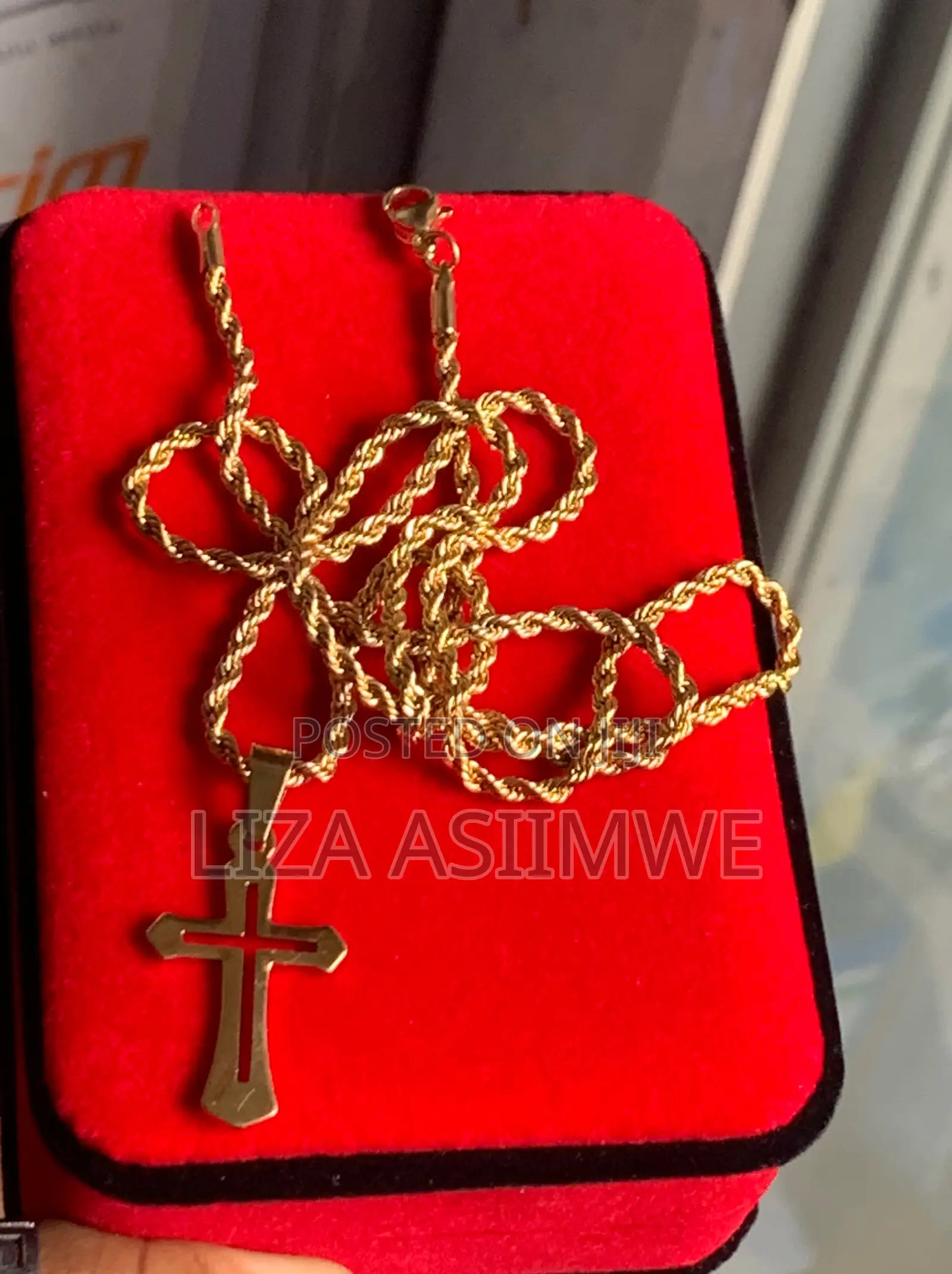 Gold-Tone Cross Necklace With a Rope Chain