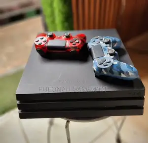 Chipped Sony Playstation 4 Pro. Used But New. 20 Games, 2 Controllers