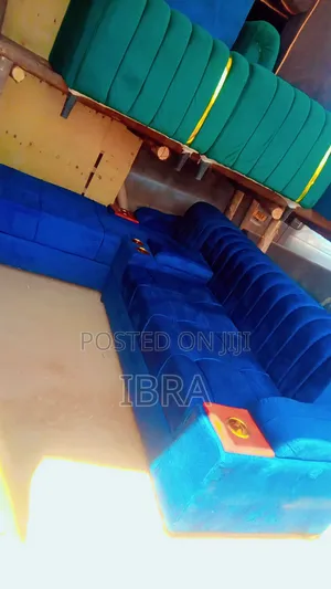 A Blue Six Seater With a Golden Cap Holder