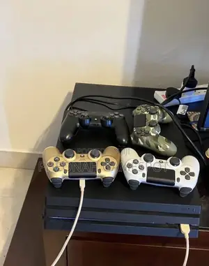 Playstation 4, 2 Pads, 12 Strong Games Loaded for Instant Gaming Fun.