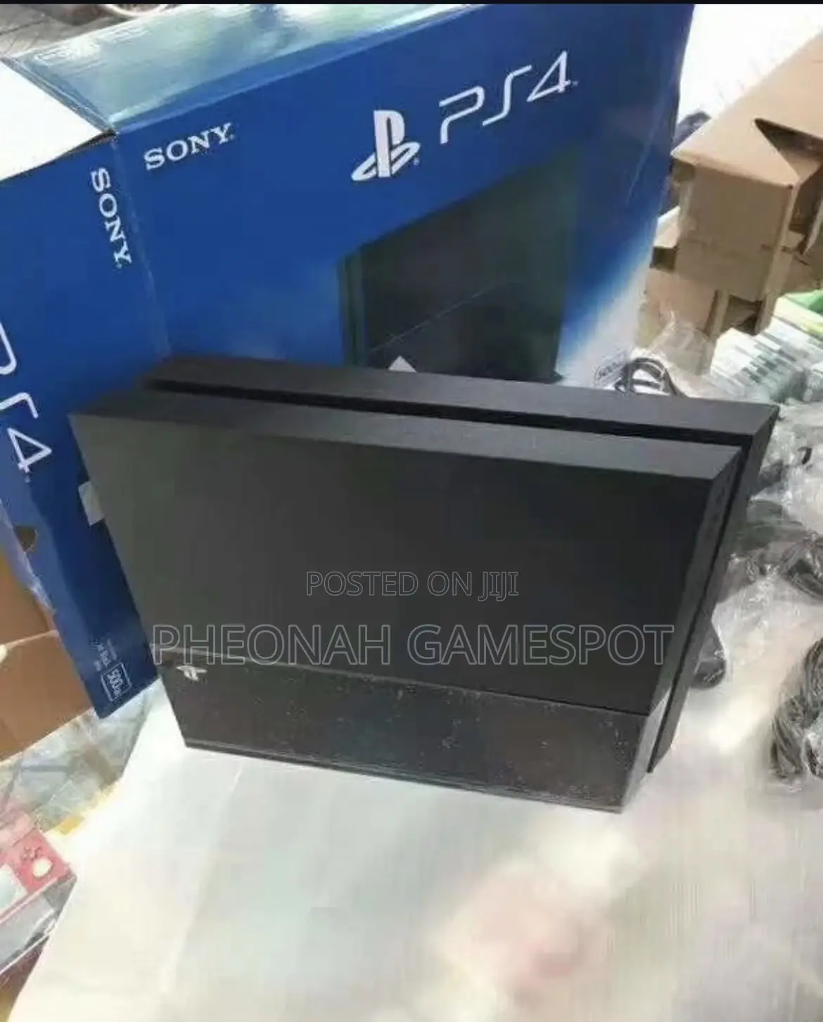 Playstation 4 With 2 Controllers and 14 Games Ready to Enjoy Now.