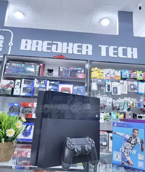 Ps4 Bundle With 2 Pads and 14 Games, Ideal for Fast Family Gaming.