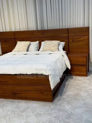 This a 5by6 /Bed in Gray Its Made /of Har Wood /and Quality Foam/