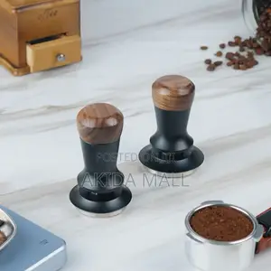 Coffee Tamper, a Tool Used to Compress Ground Coffee Into a Dense,