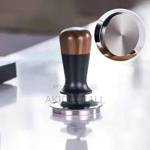 Coffee Tamper, a Tool Used to Compress Ground Coffee Into a Dense,