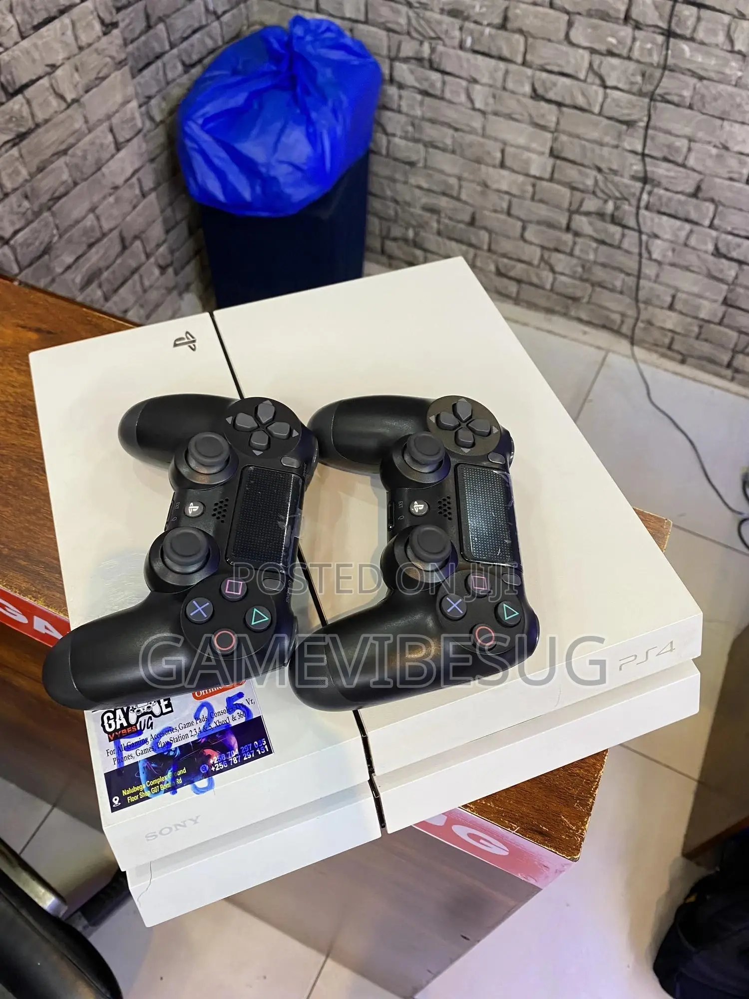 White Ps4 and Game Controllers