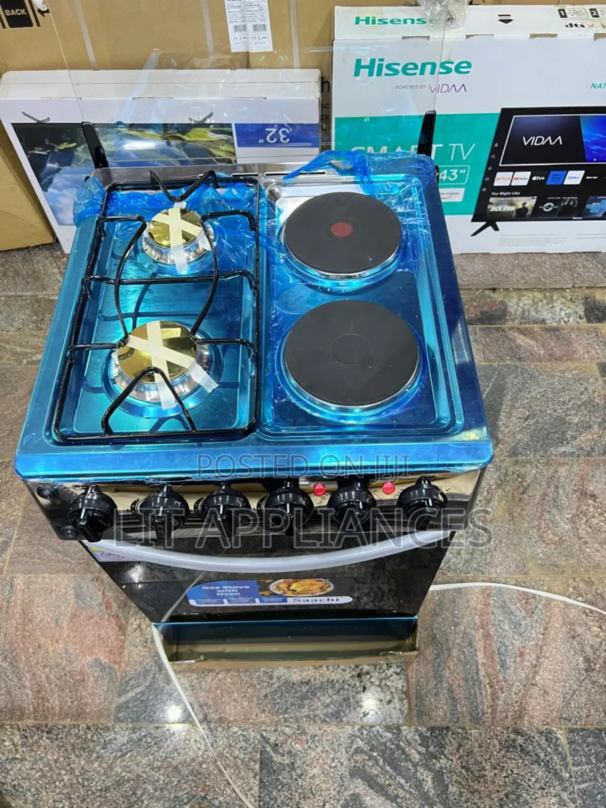Saachi 50*50,2gas +2hotplates, Auto Ignition, Chicken Rotisserie.