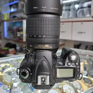 D90 Nikno Camera and 18-105mm