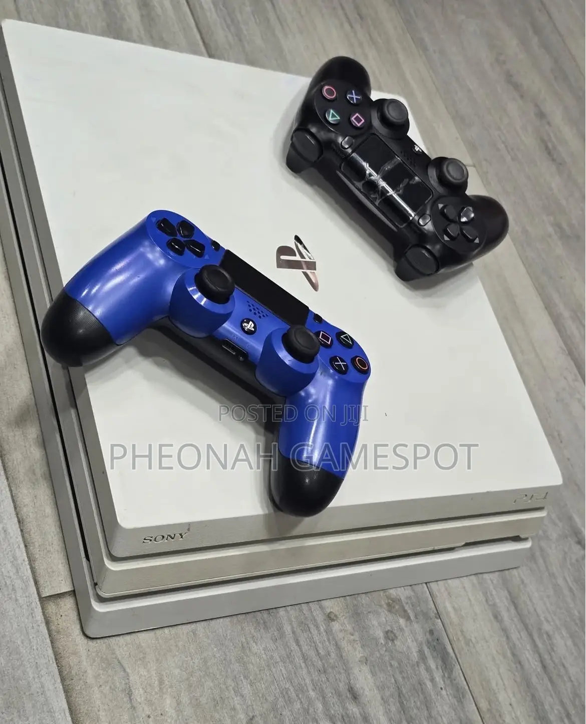 Ps4 Pro System With 2 Controllers and 10 Games, Clean and Reliable.