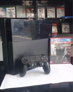 Ps4 Unit With 2 Controllers and 15 Games, Smooth Performance.