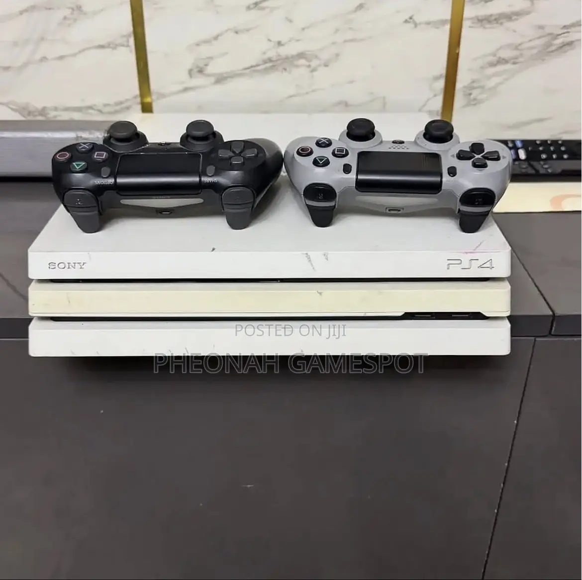 Ps4 Console With 2 Controllers and 19 Games, Perfect for Fun Time.