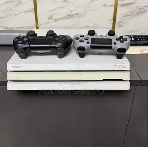 Ps4 Console With 2 Controllers and 19 Games, Perfect for Fun Time.