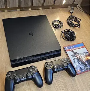 Playstation 4, 2 Pads, 10 Installed Games, Works Perfectly Well.