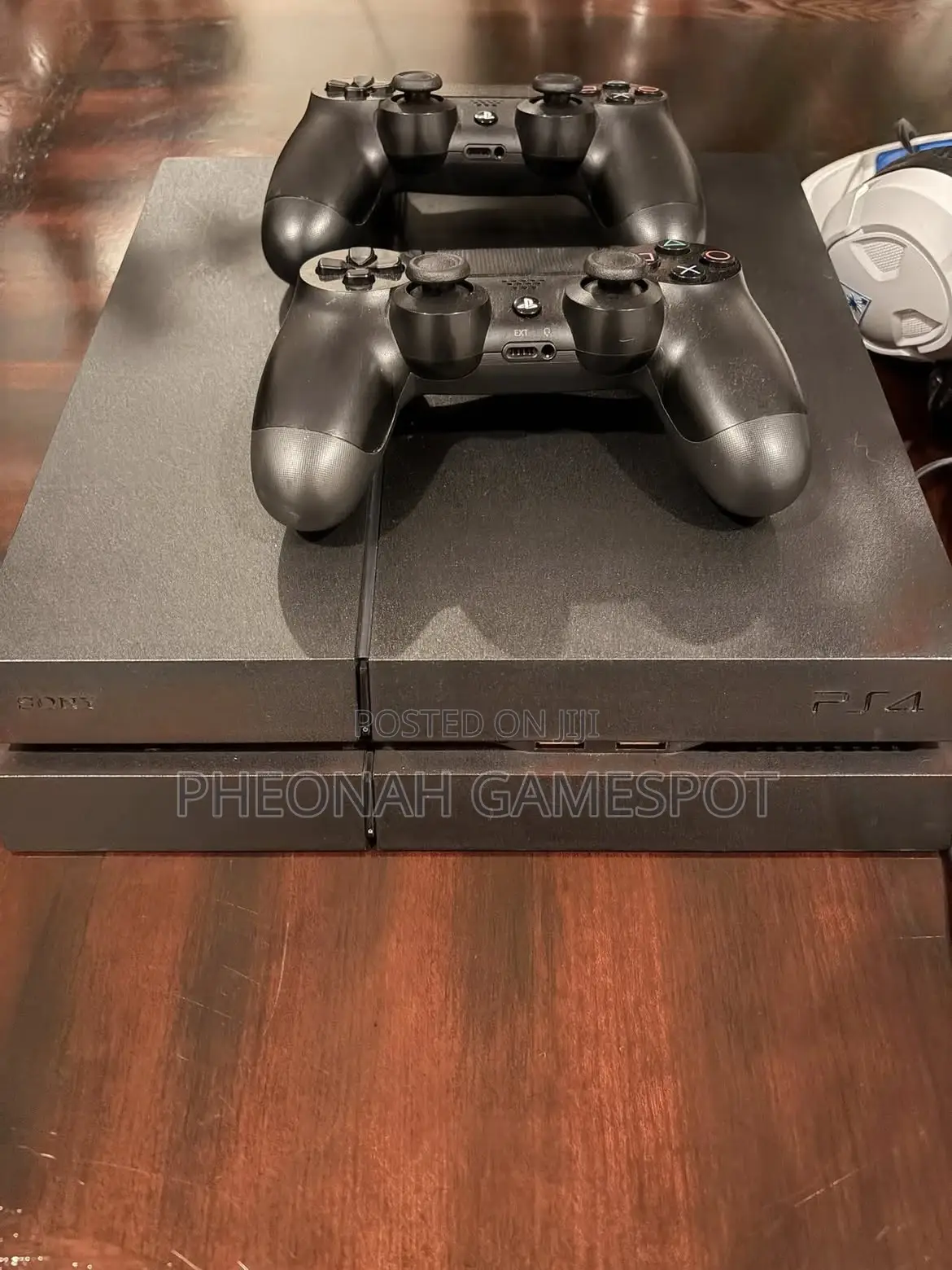 Playstation 4, 2 Controllers, 13 Games Loaded for Smooth Sessions.